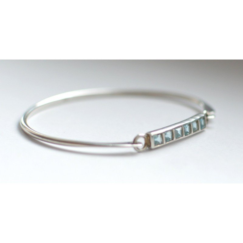 Silver bracelet with topaz