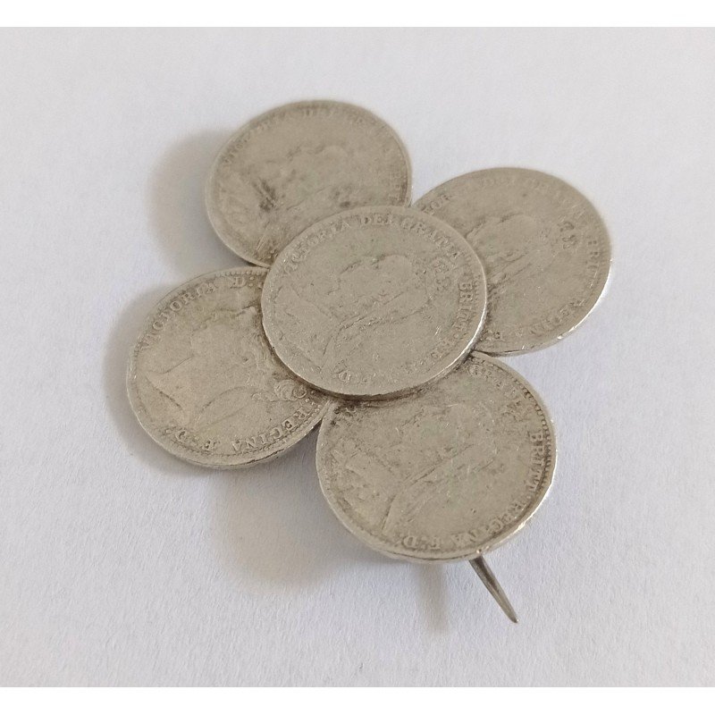 Silver brooch with Victorian threepence coins