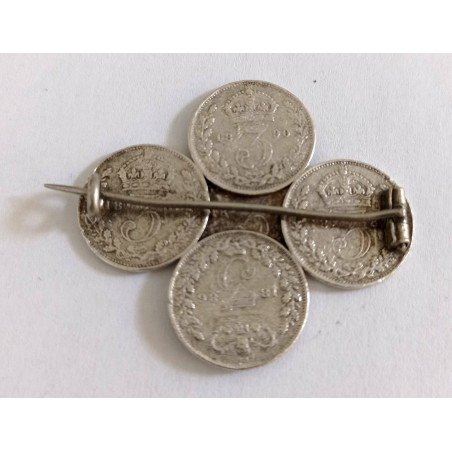 Silver brooch with Victorian threepence coins