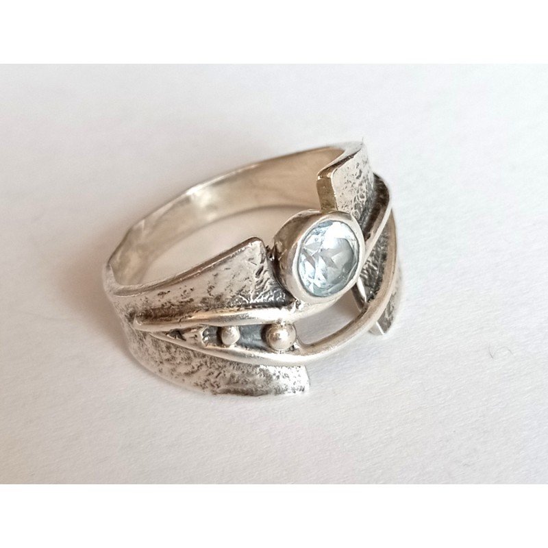 Silver ring with topaz