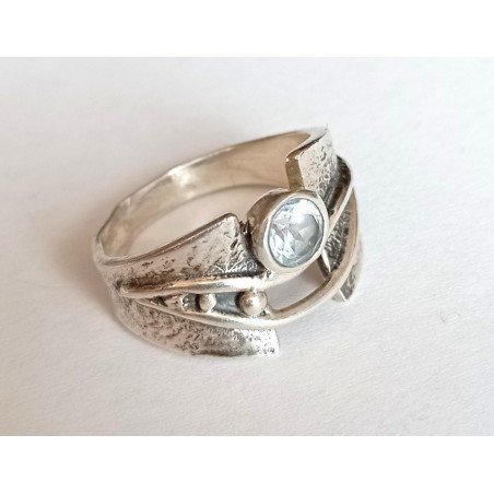 Silver ring with topaz