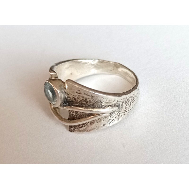 Silver ring with topaz