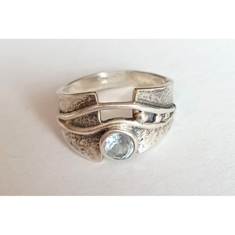 Silver ring with topaz