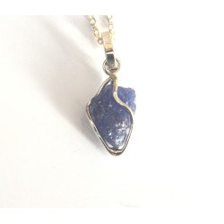Silver pendant with rough sapphire