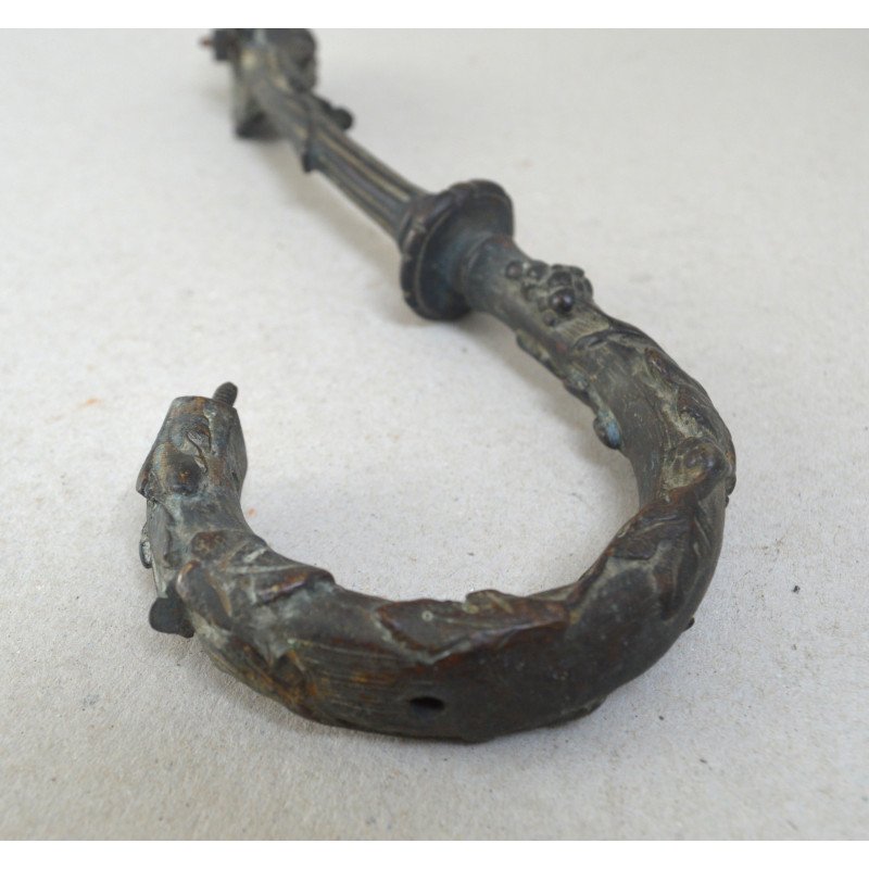 Richly ornamented bronze handle, 18th-19th century