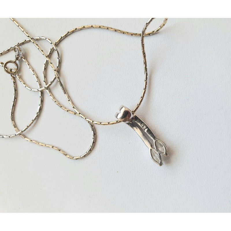 18k white gold chain with 18k gold diamond pendant